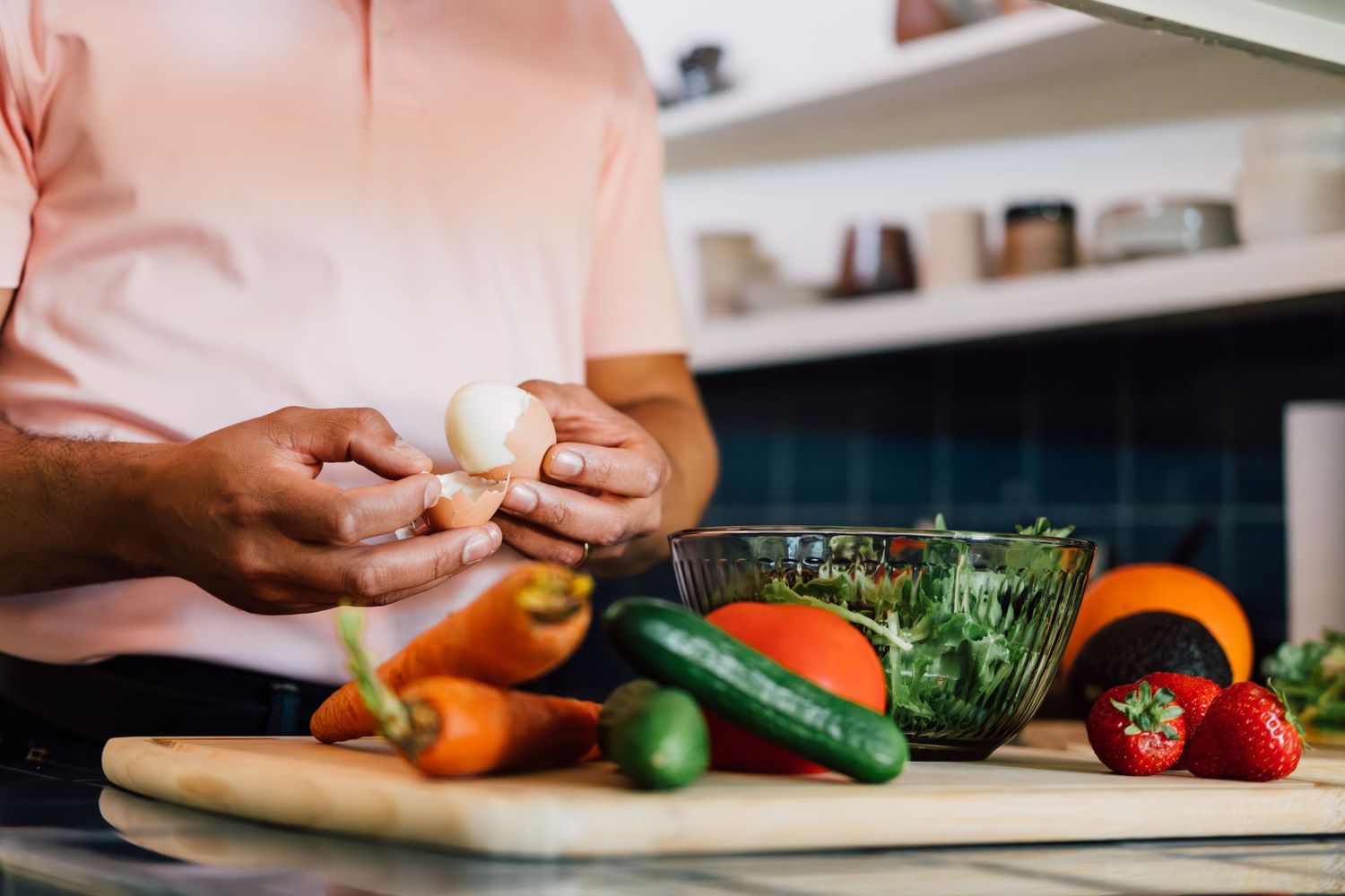 Fresh produce being chopped & prepared on kitchen cutting board. Personal branding photography for a holistic physician in Oakland.