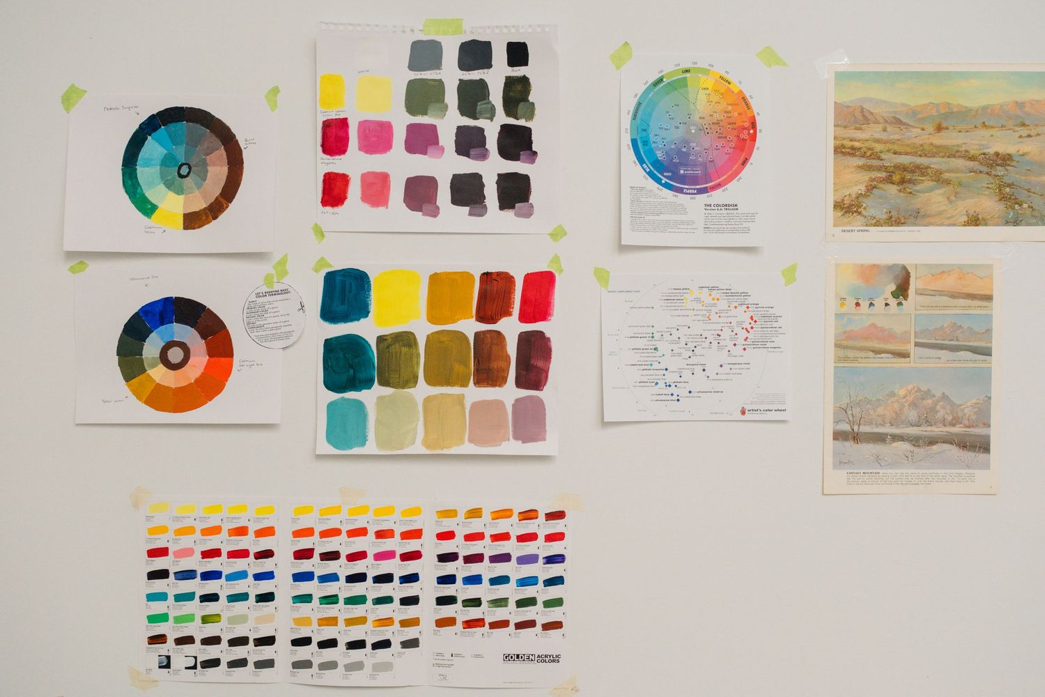 Color swatches and artistic studies displayed on a white wall. Example of personal branding stock photo for San Francisco artist.