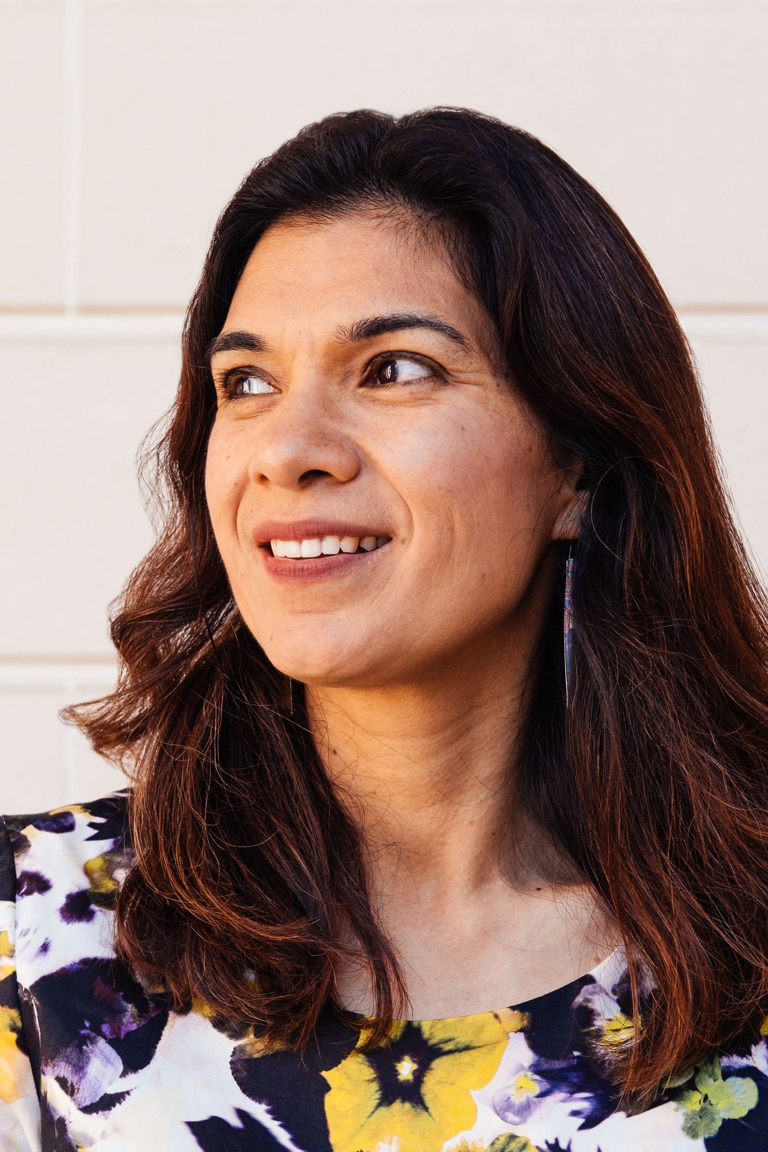Lifestyle and colorful headshot/portrait of a lawyer in Legion of Honor courtyard, taken by San Francisco brand photographer Jenn Chen.