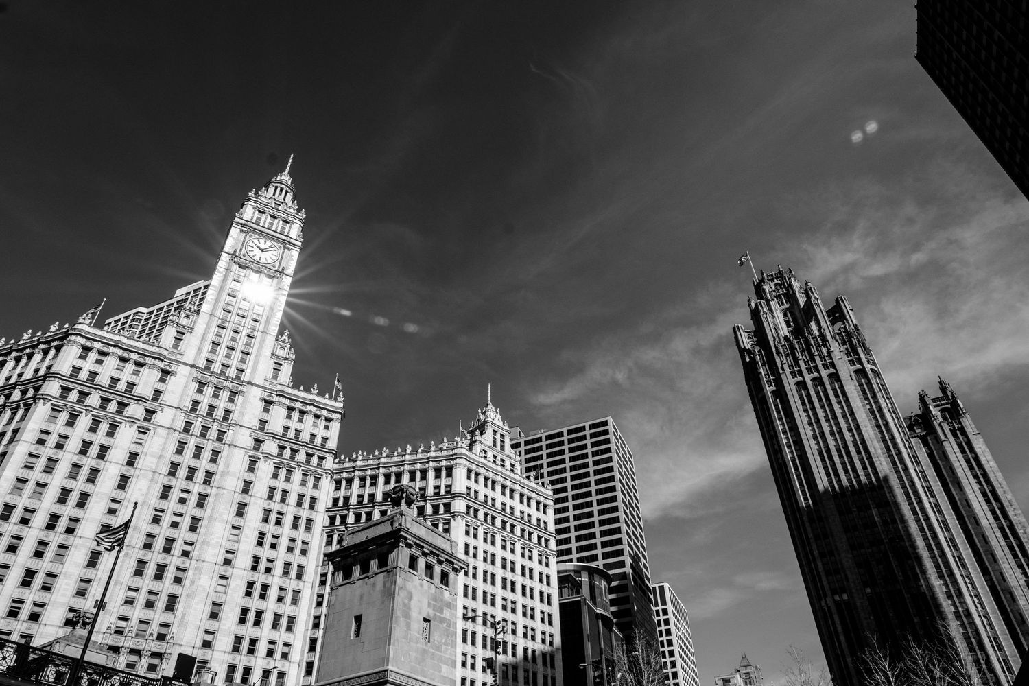 Black and white architectural photo of Chicago's historic Wrigley Building and surrounding towers.