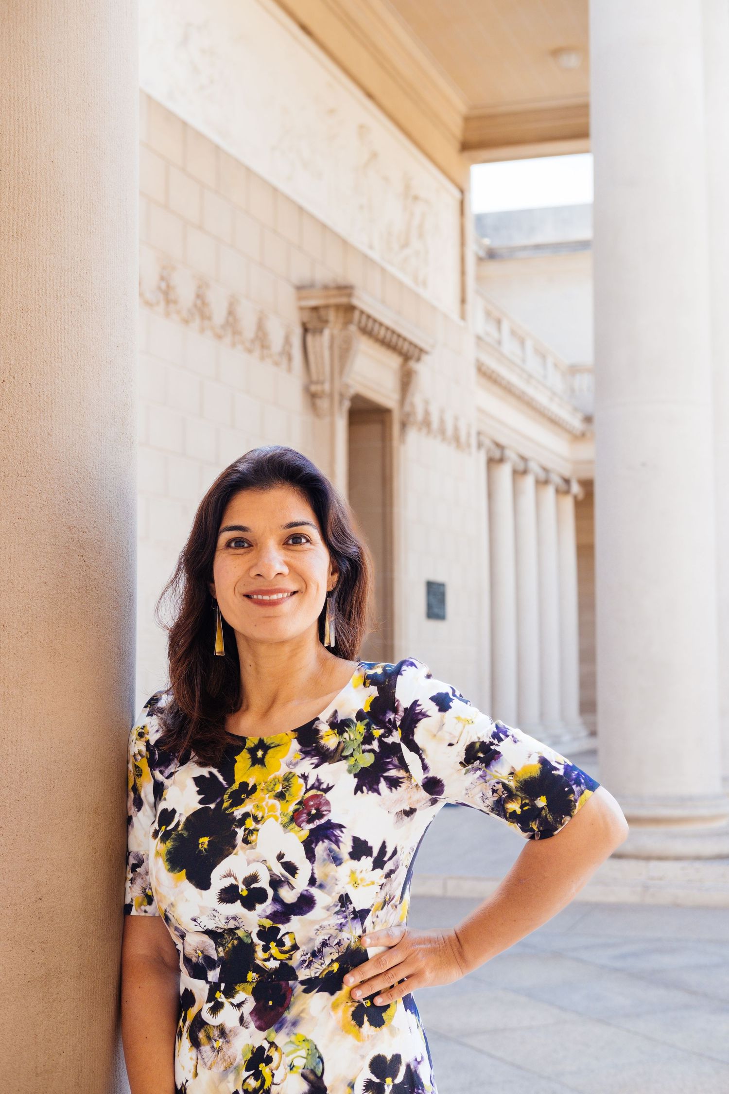 Lifestyle and colorful headshot/portrait of a lawyer in Legion of Honor courtyard, taken by San Francisco brand photographer Jenn Chen.