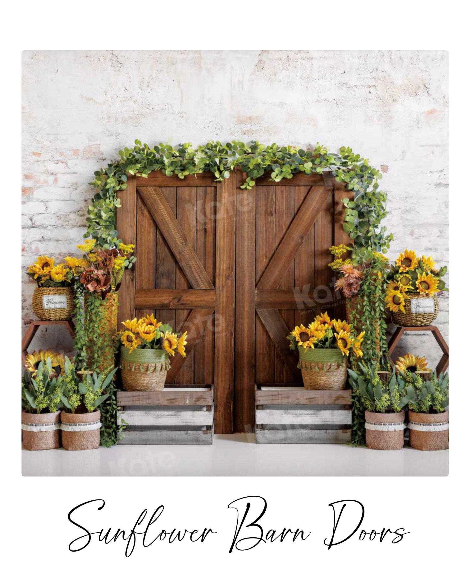 Rustic wooden barn doors decorated with sunflowers and greenery garlands against a white brick wall backdrop.
