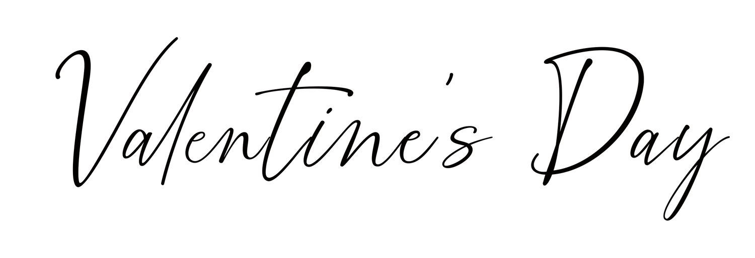 Elegant cursive script text reading Valentine's Day in black handwritten calligraphy on white background.