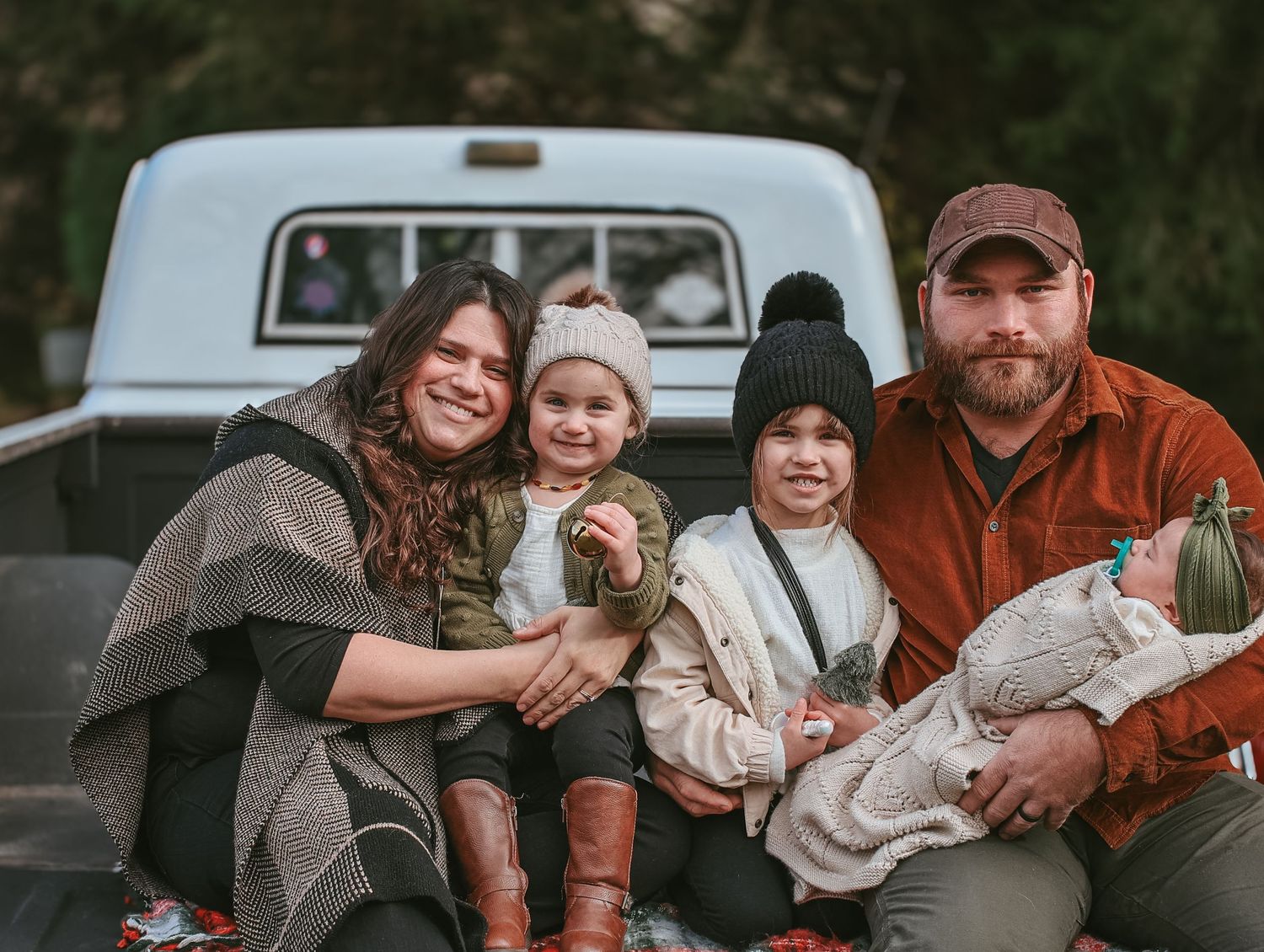 A series of candid outdoor family photos showing playful moments and laughter between parents and children.