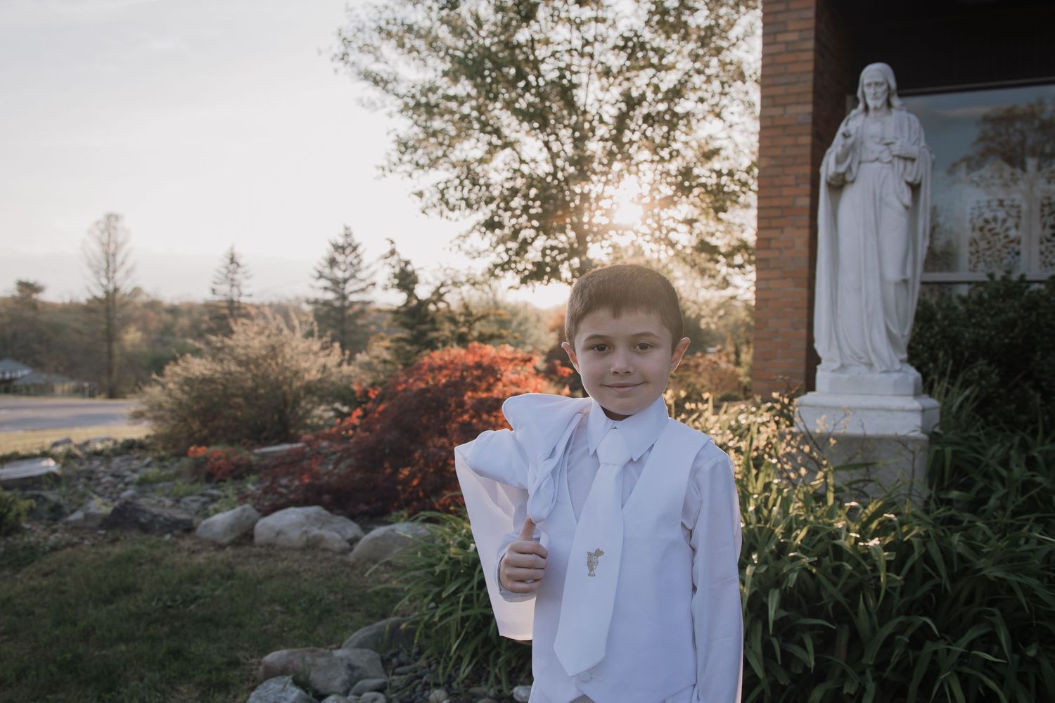 A series of outdoor photos showing a person in white clothing against various natural backdrops at sunset.