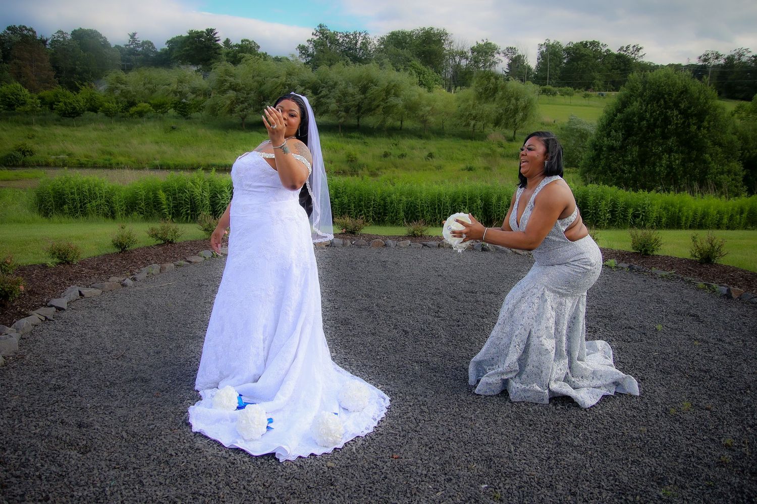 A series of photos showing a white wedding dress against a dark gravel surface in an outdoor setting.