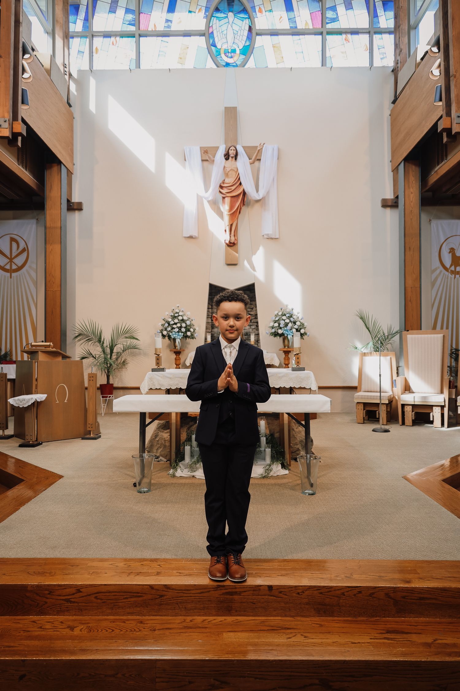 A sequence of images showing a child in black clothing moving playfully across a church altar stage with wooden floors.