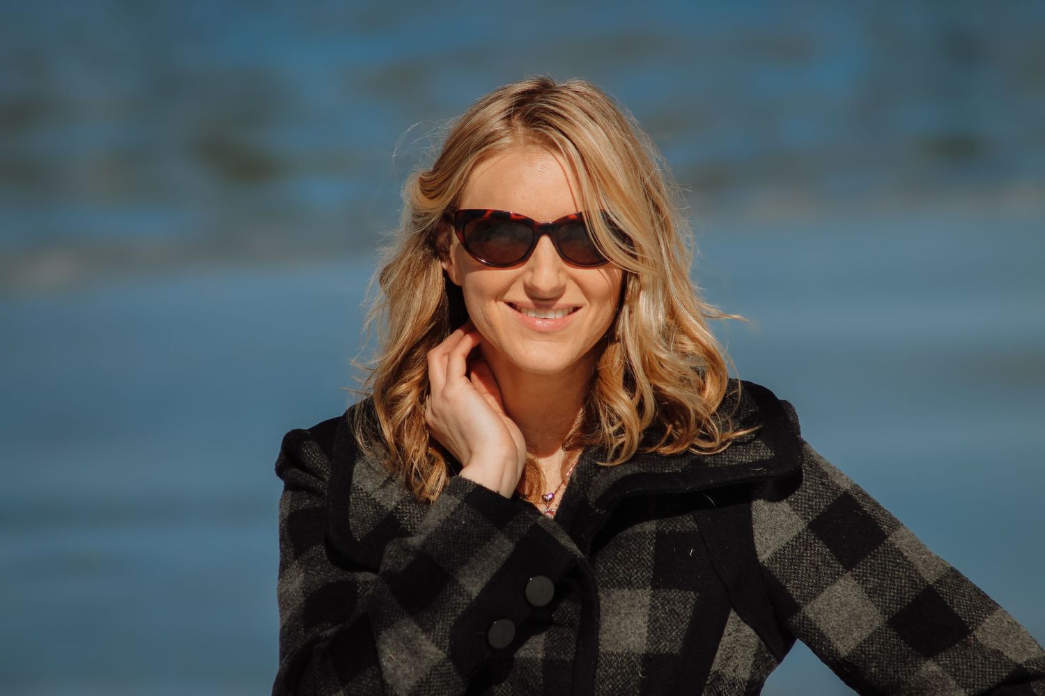 A series of headshots showing a person wearing sunglasses and a plaid shirt against a blue background.