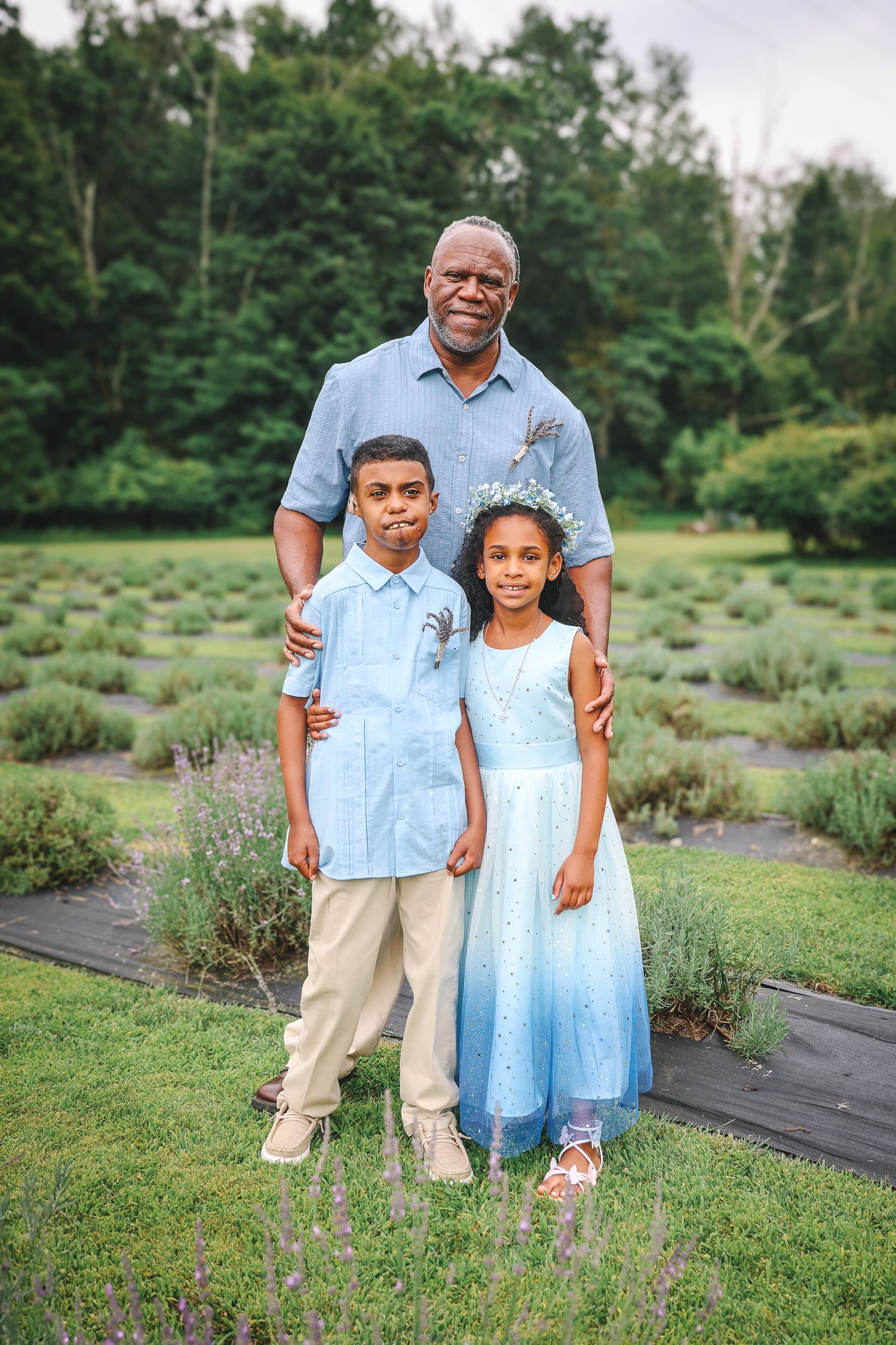 Three outdoor portraits of family members standing together in a garden setting with green foliage in the background.