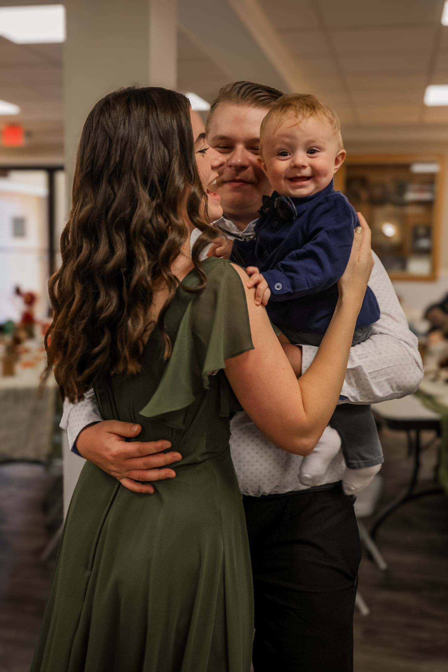 A series of candid family moments showing joyful interactions and embraces in an indoor setting.