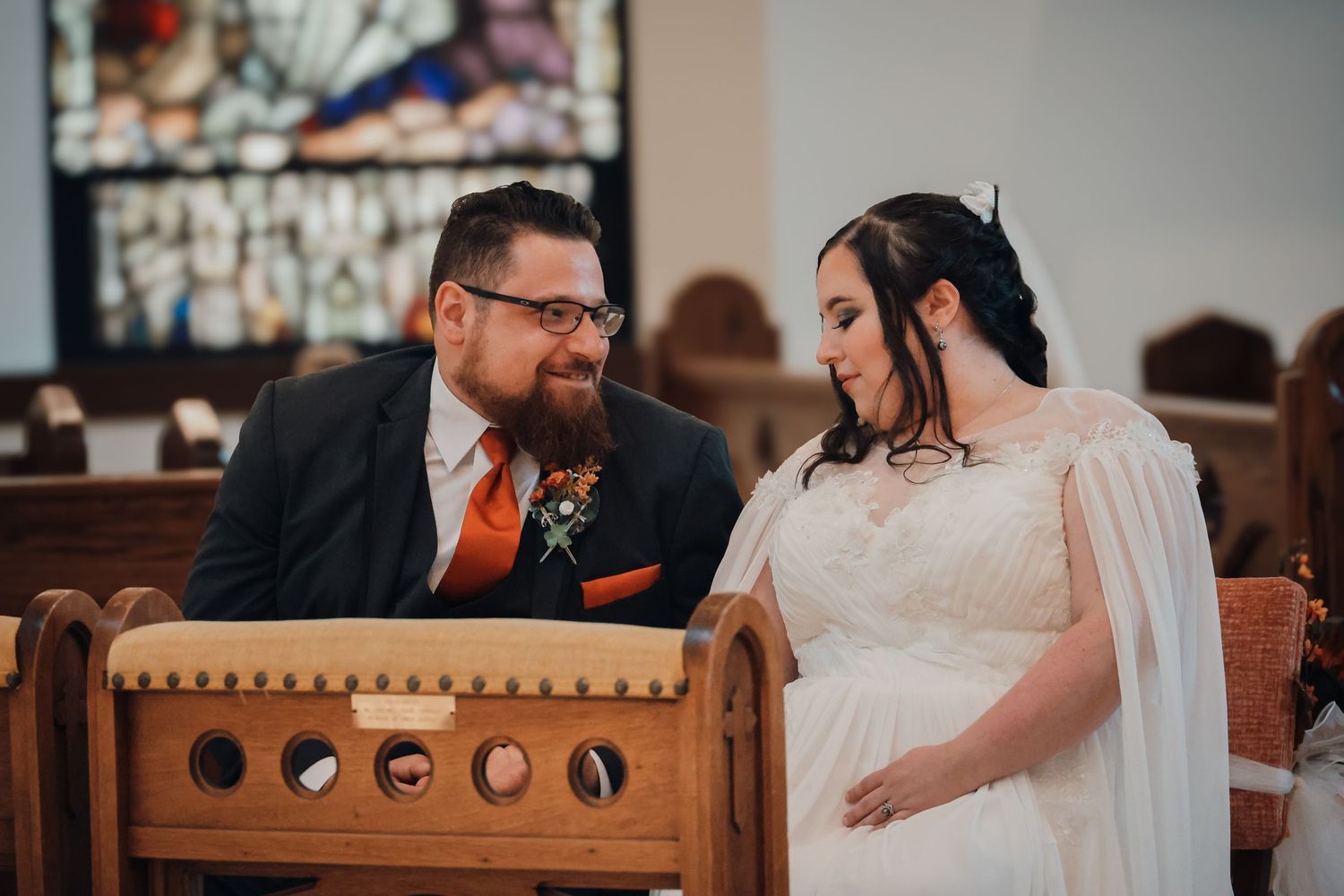 A bride and groom share intimate moments during their wedding reception, shown in a series of candid photographs.