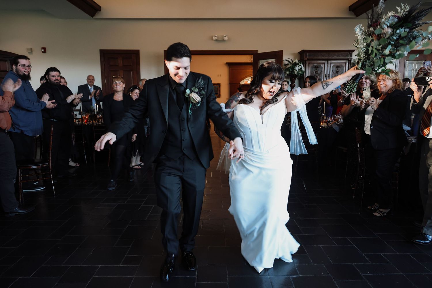 A series of wedding reception photos showing guests dancing and celebrating on a dark dance floor.