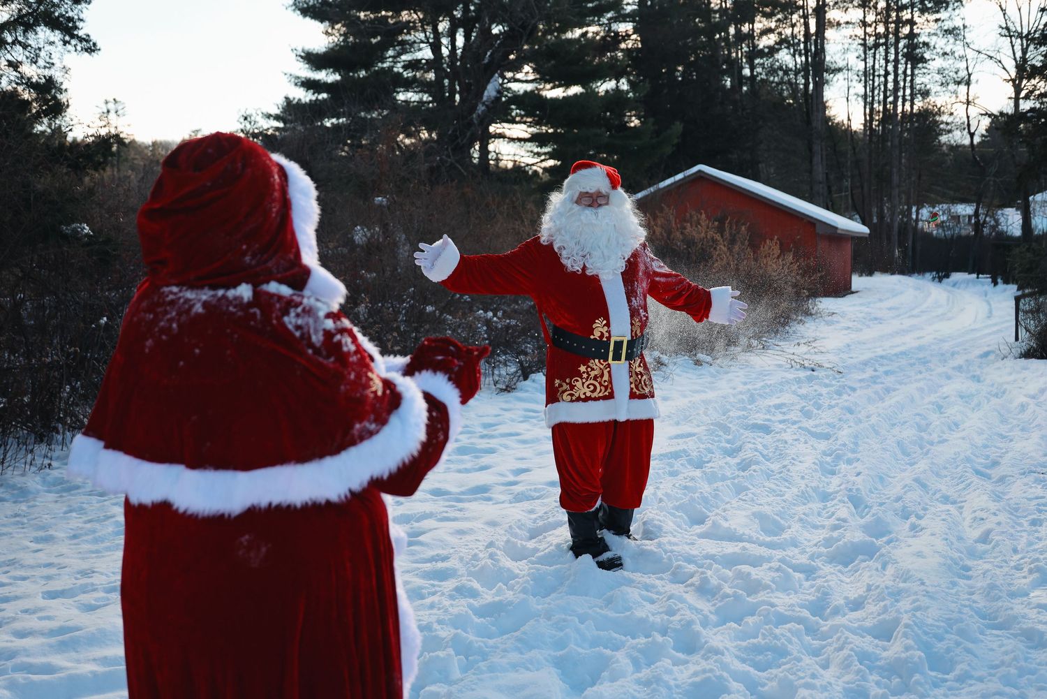 A series of snowy winter scenes with festive holiday figures walking through a snow-covered landscape.