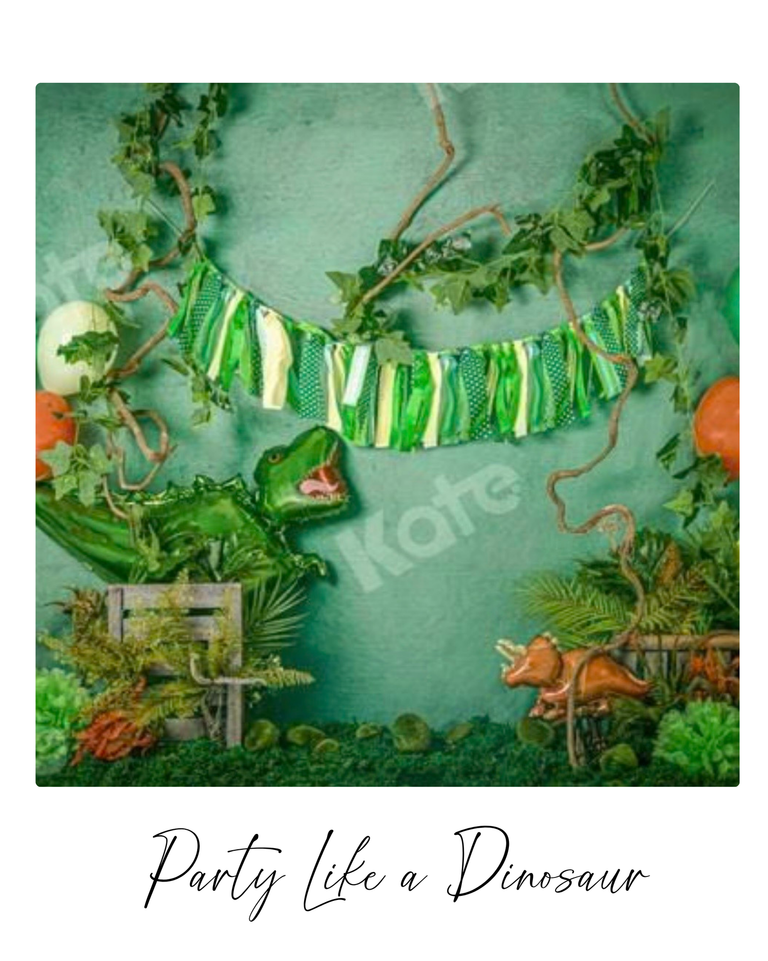 Dinosaur party backdrop with green banner, jungle vines, T-rex balloon, and triceratops decorations on teal background.
