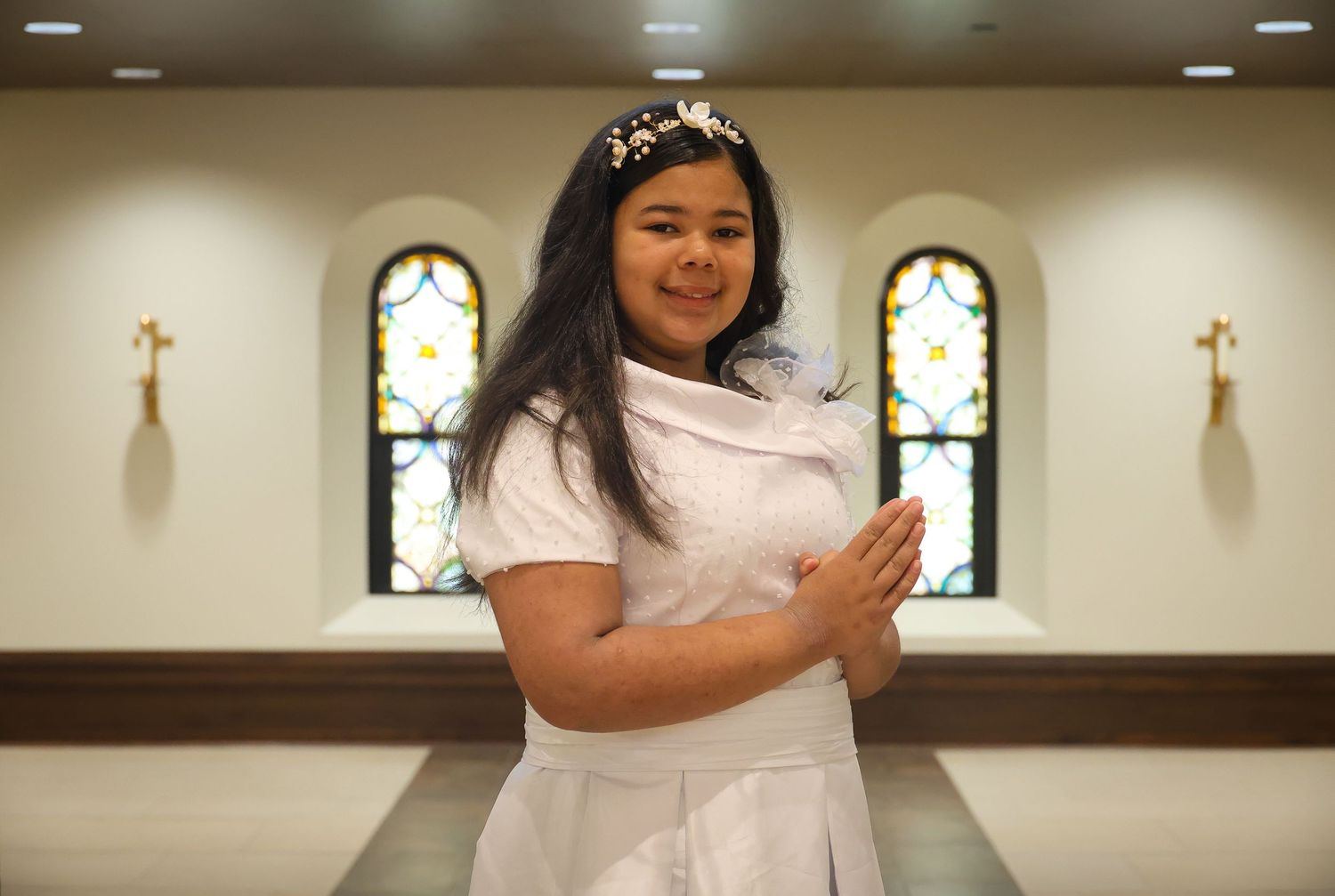 A group of photos showing people in white nursing uniforms standing in a church or chapel with stained glass windows.