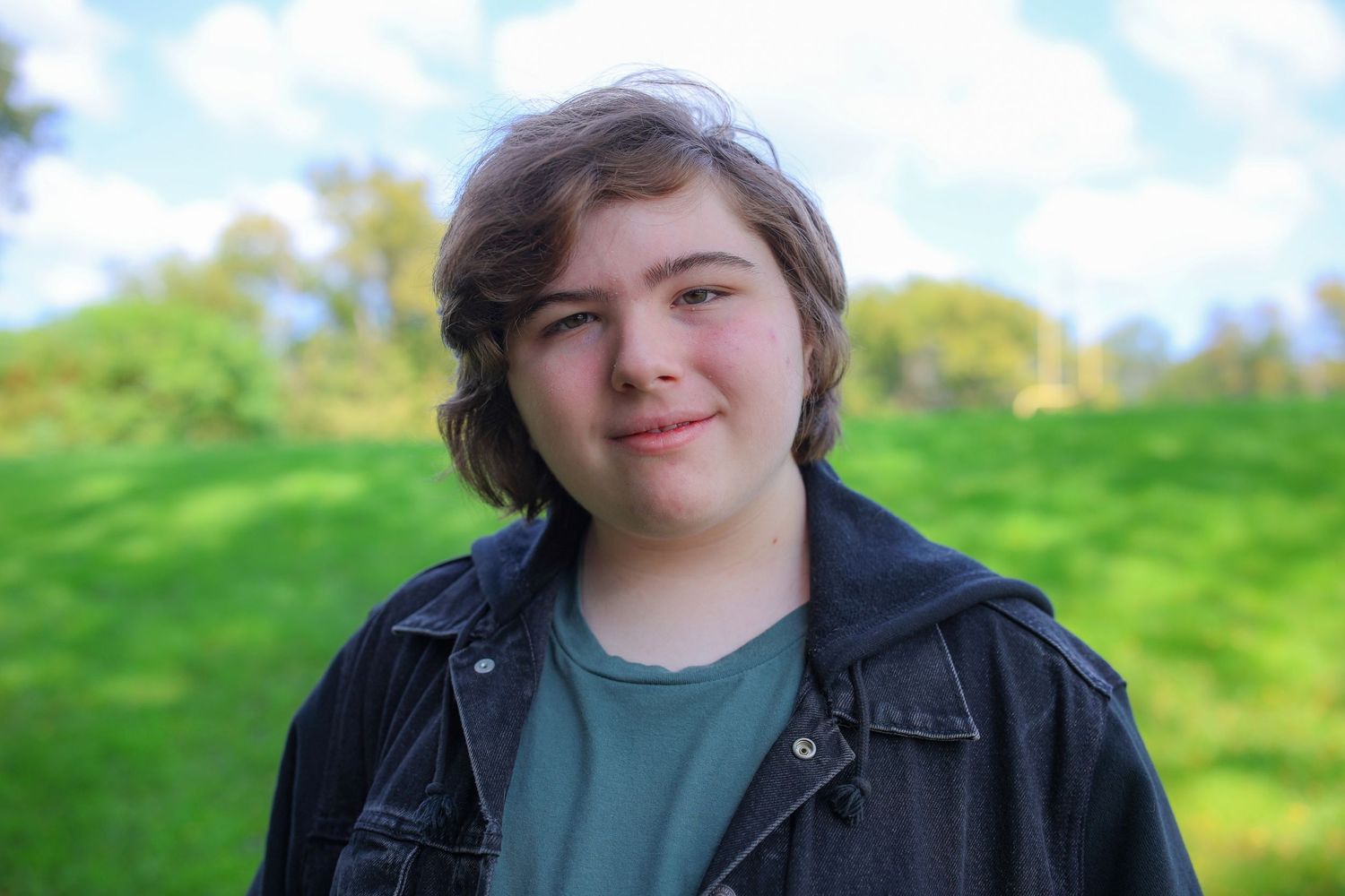 A series of seven similar photos showing a person in casual attire standing outdoors against a green natural background.