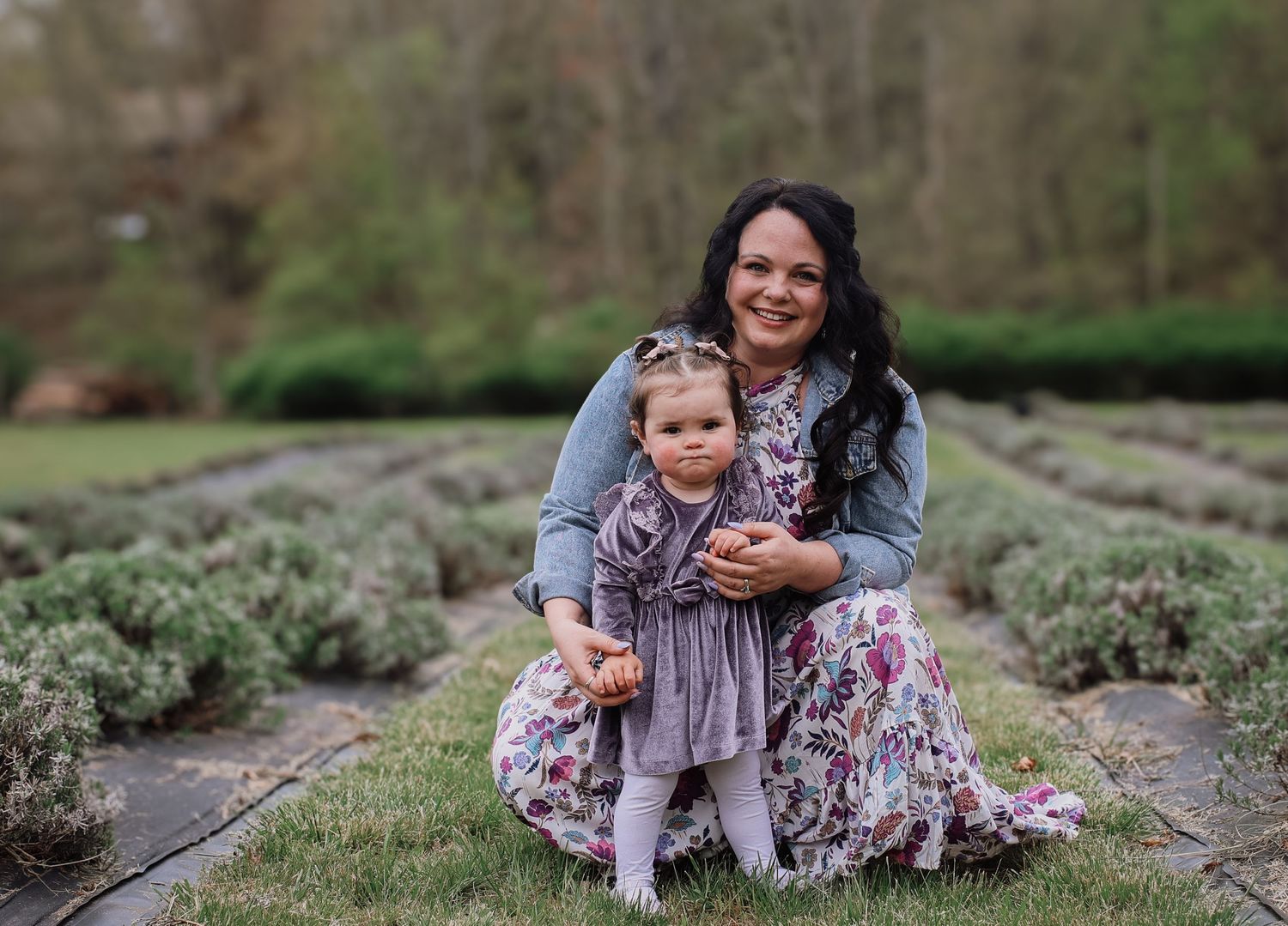 A series of candid outdoor family portraits taken in a natural setting with grass and greenery in the background.