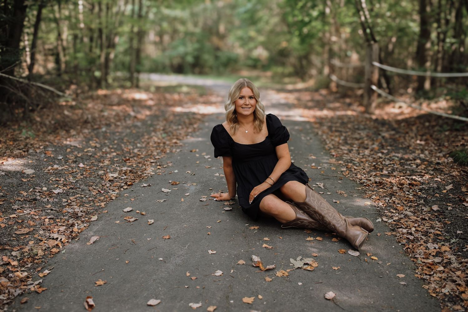 A series of outdoor portrait photos on a leaf-covered forest path in autumn.