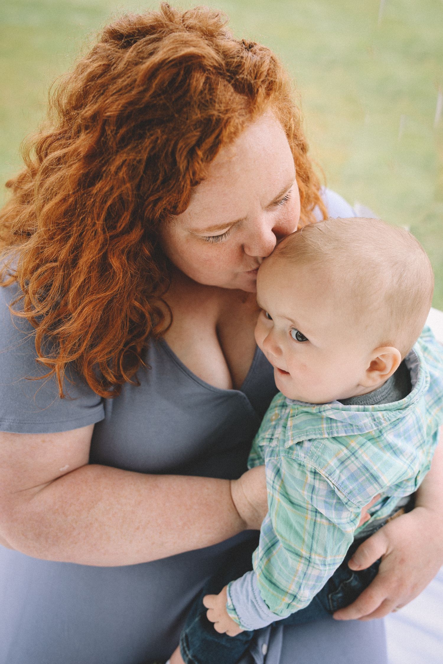 A tender moment between parent and baby in a series of affectionate poses showing cuddles and kisses.