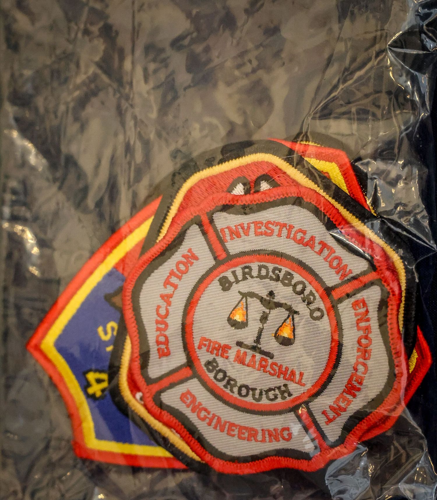 Birdsboro Borough Fire Marshal embroidered patch featuring a Maltese cross with scales of justice symbol.