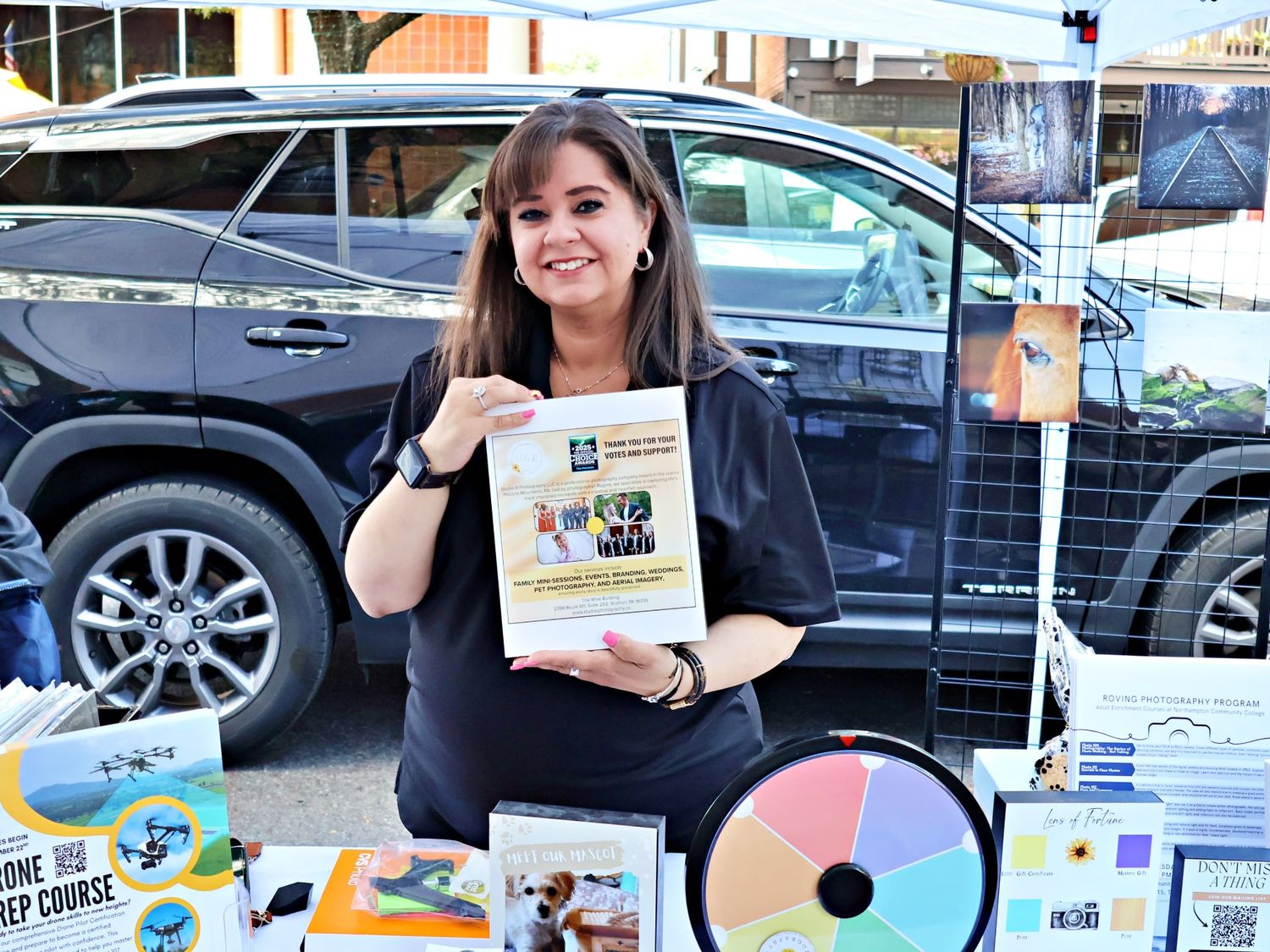 Multiple promotional photos showing people receiving documents and keys near cars at a car dealership.