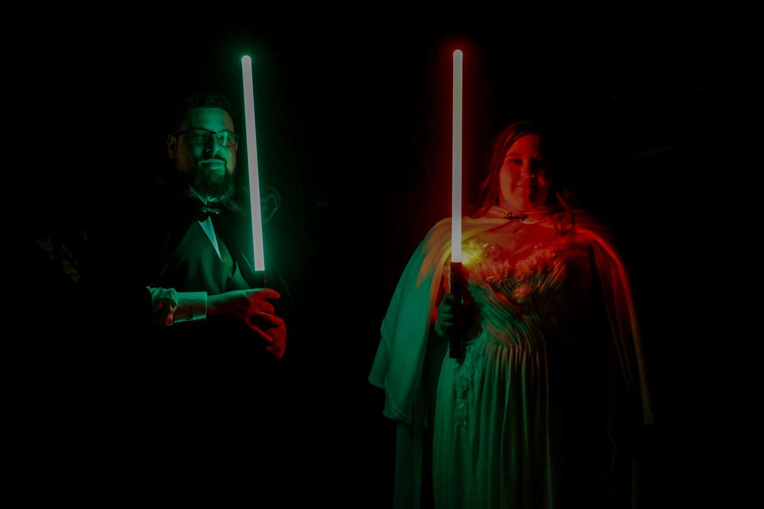 Dramatic lighting alternates between red and green in a series of dark atmospheric performance shots.