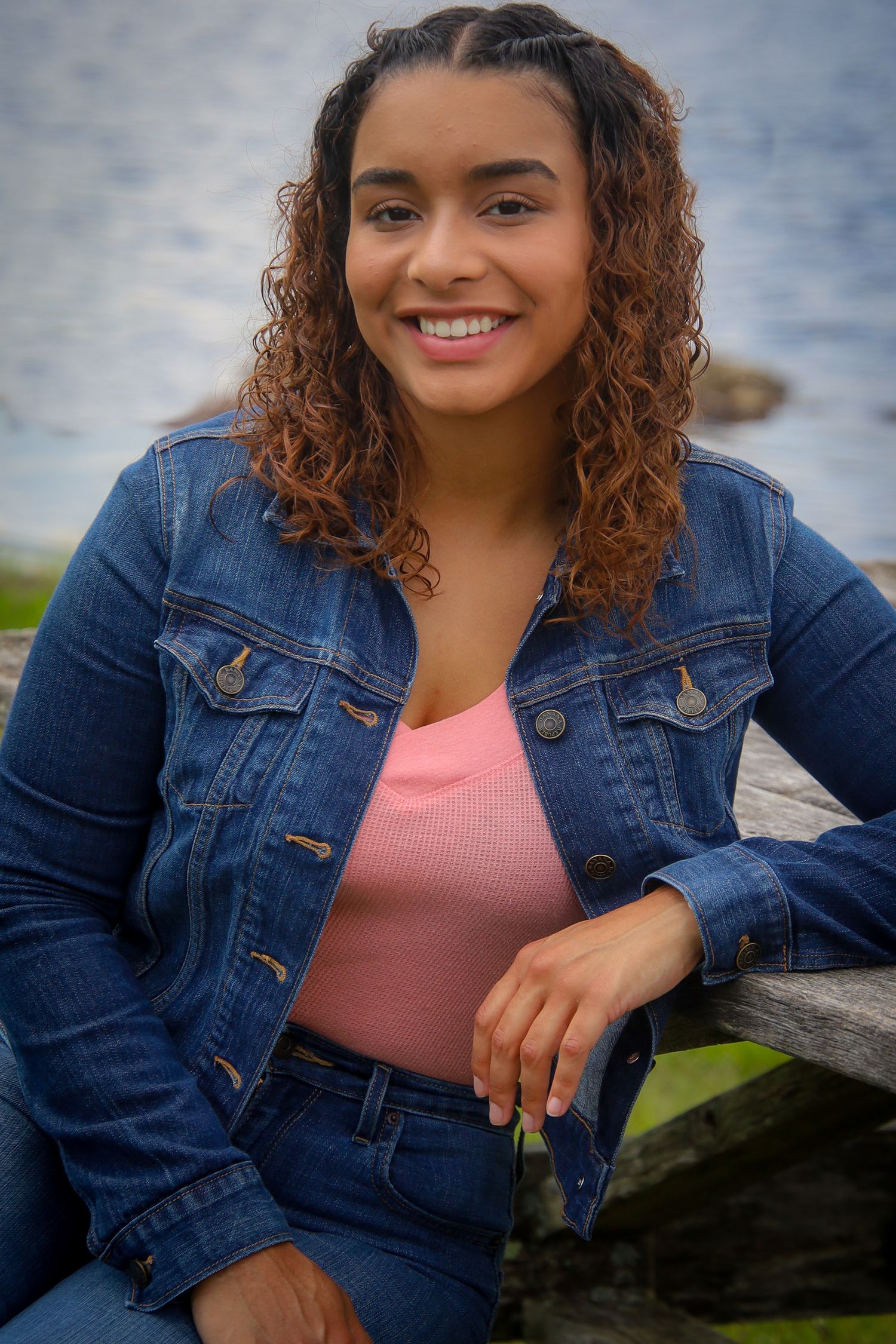 A series of outdoor portrait photos featuring someone in a denim jacket and coral top against a blurred natural background.