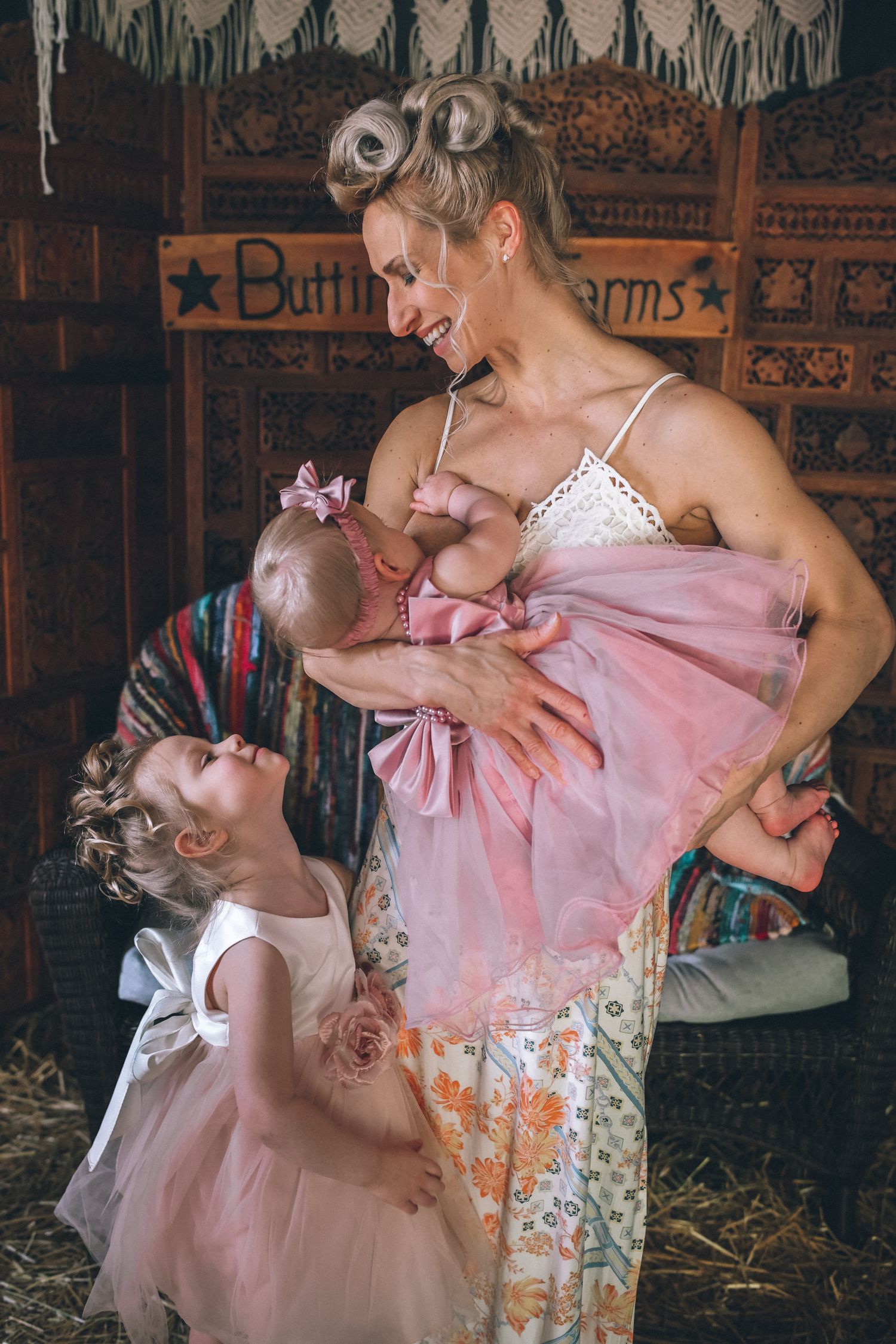A series of photos showing a ballerina in a pink tutu performing graceful dance movements in a rustic barn setting.
