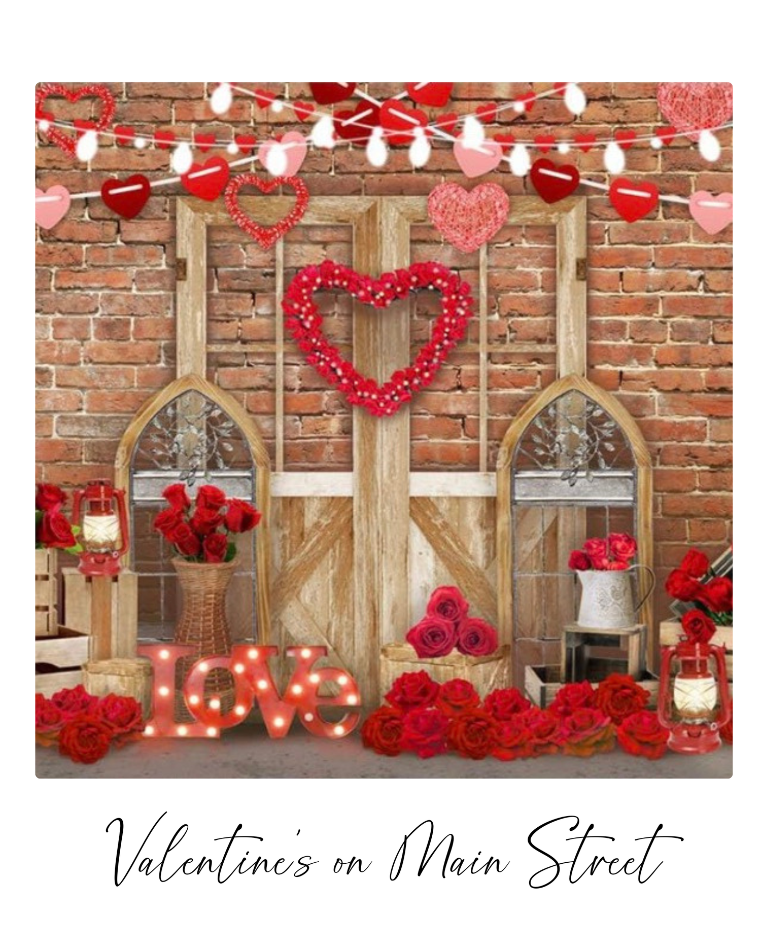 Rustic wooden doors decorated with red roses, hearts, and string lights create a romantic Valentine's Day display against a brick wall.