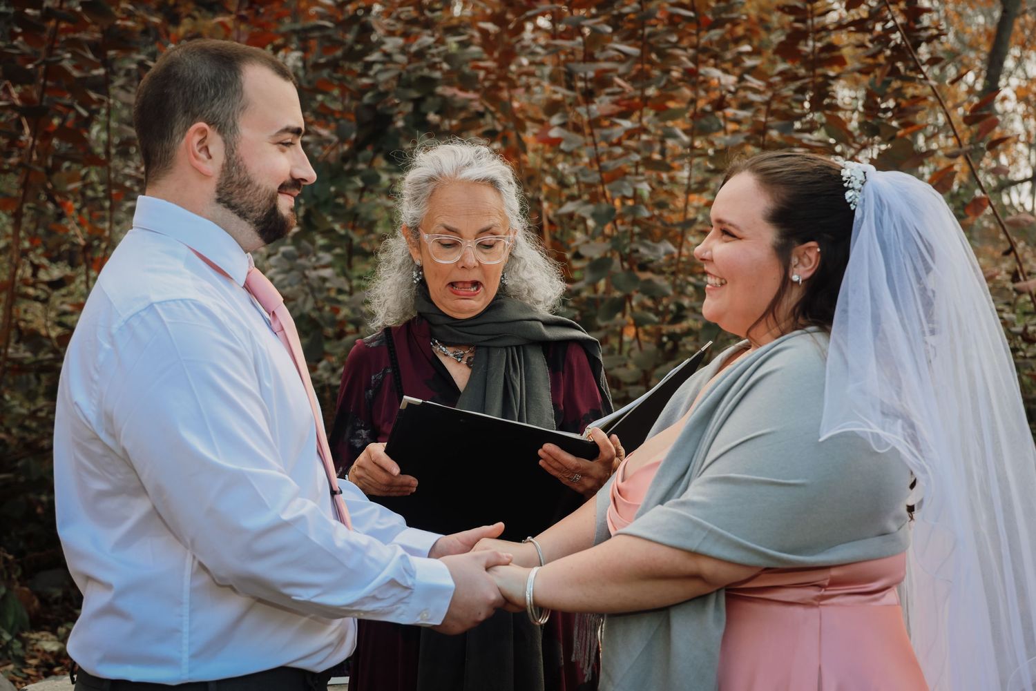 A series of five wedding ceremony photos showing emotional moments between couples and loved ones during the celebration.