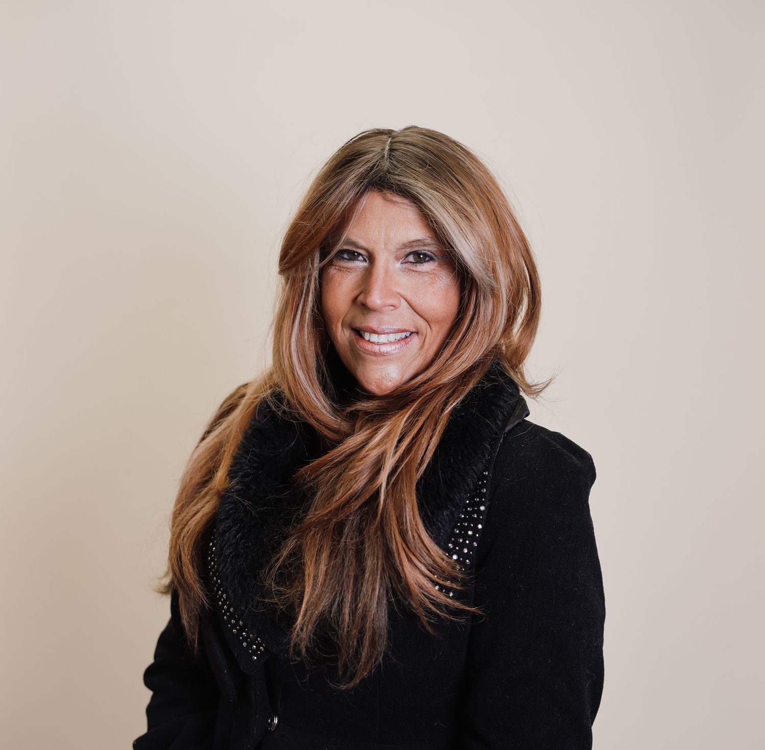 Professional portrait series showing a person in a black jacket against a neutral background.