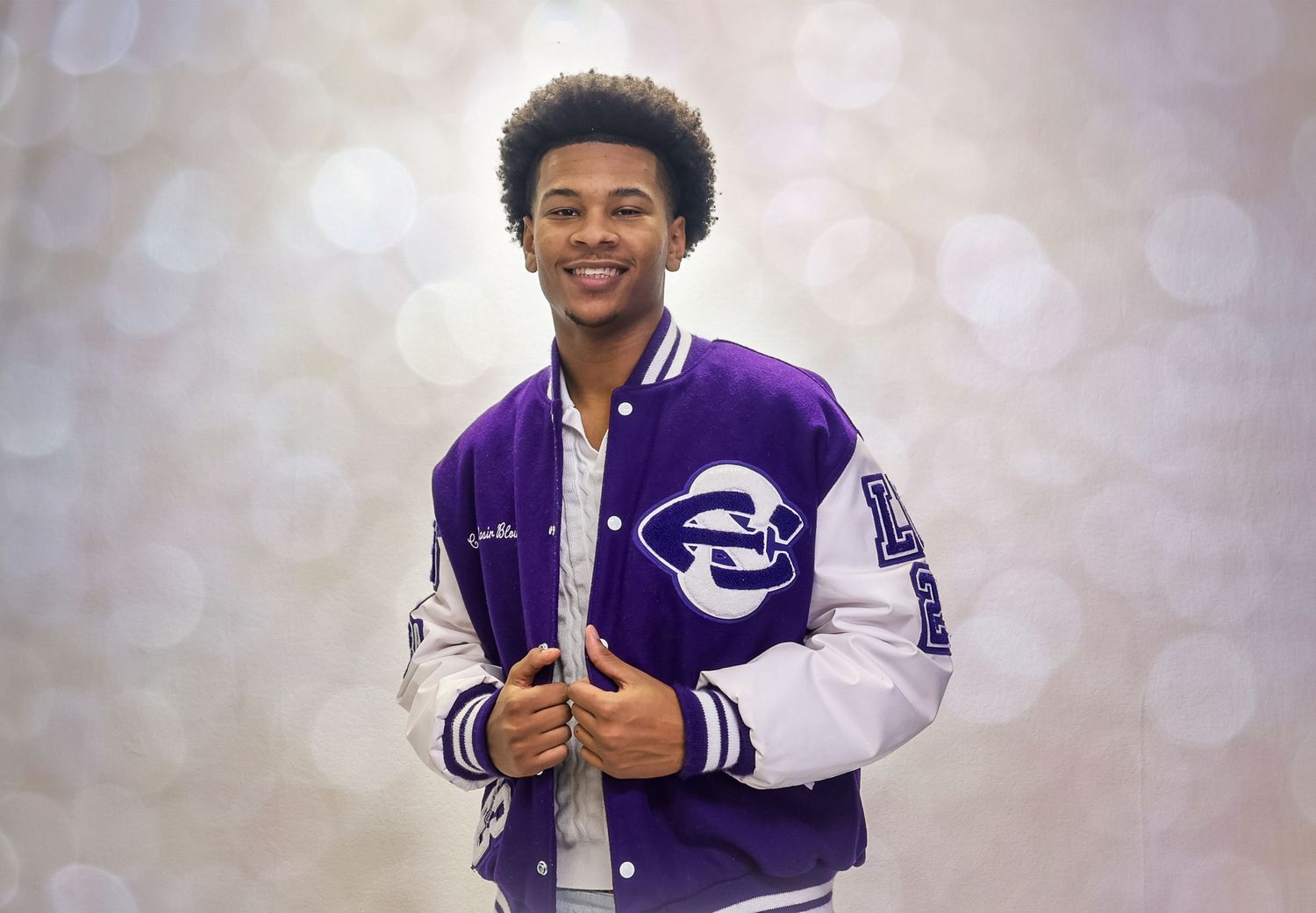 A collage of football players in purple and white uniforms posing and smiling for promotional photos.