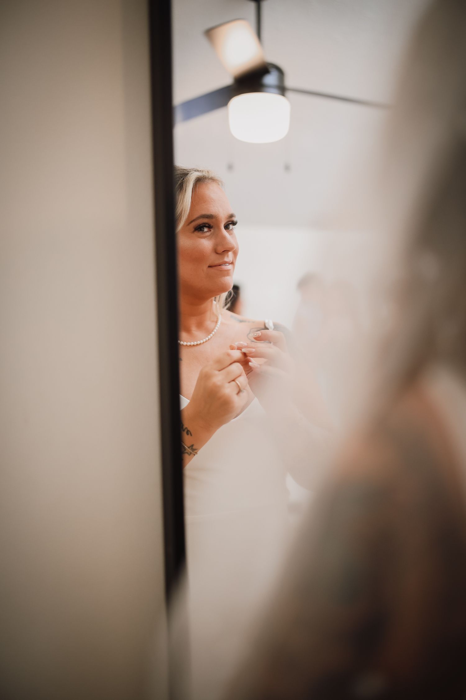 A series of soft focus profile shots showing someone in white against a blurred background.