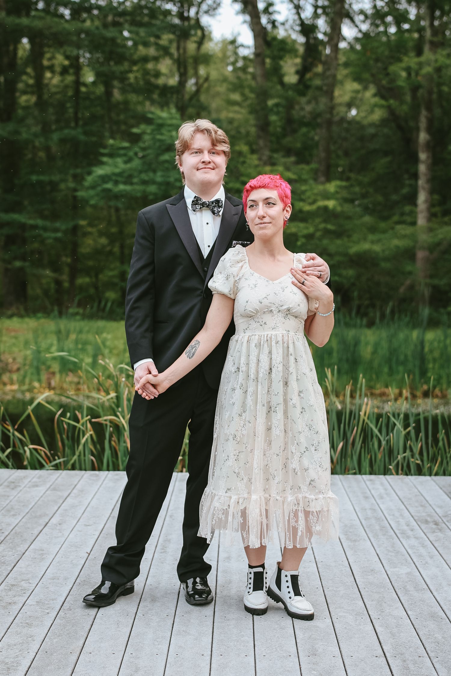 A series of wedding photos showing feet and formal attire on a wooden deck surrounded by lush greenery.