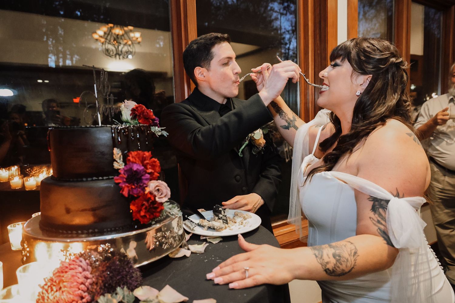 A series of wedding reception photos showing cake cutting and dancing moments in an indoor venue with warm lighting.