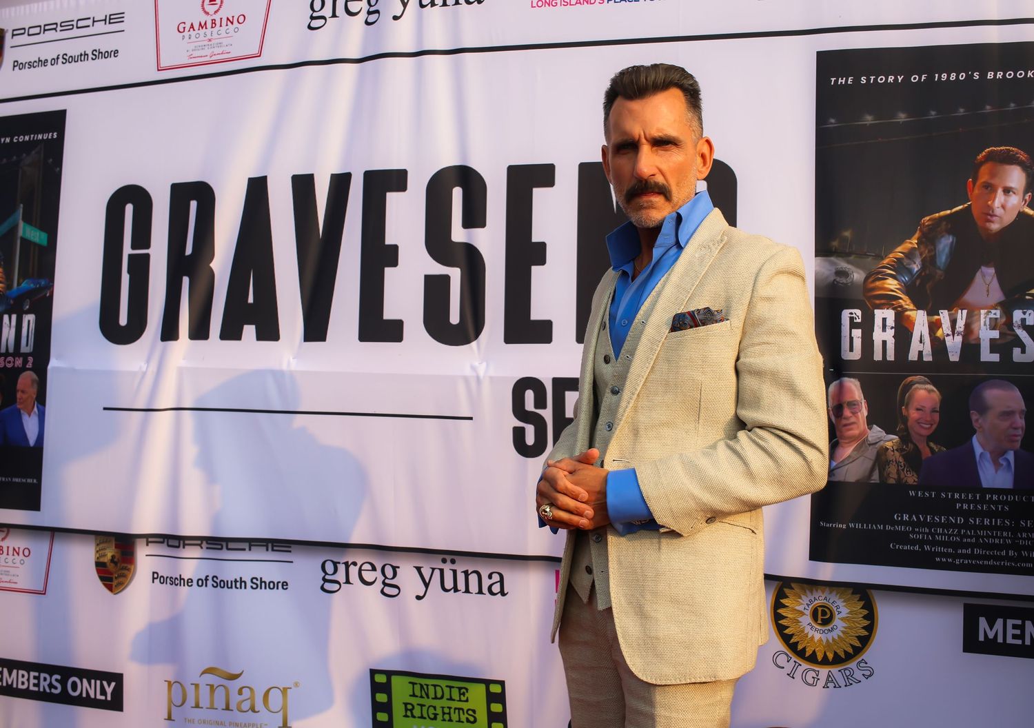 Author Greg Jund appears at multiple book signing events with his novel Graveset displayed on promotional banners.
