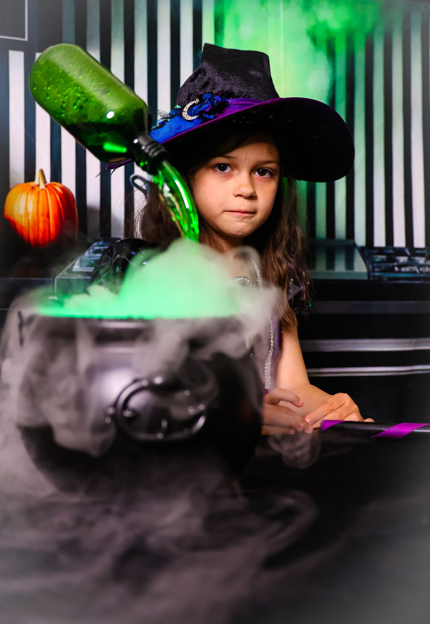 A sequence of spooky Halloween-themed photos with green lighting and fog effects creating an eerie atmosphere.