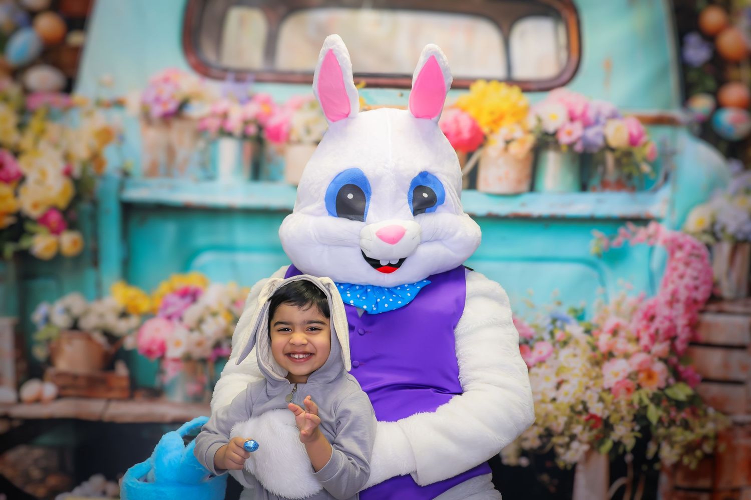A series of Easter-themed photos showing a fluffy white bunny mascot costume posing in colorful spring settings.