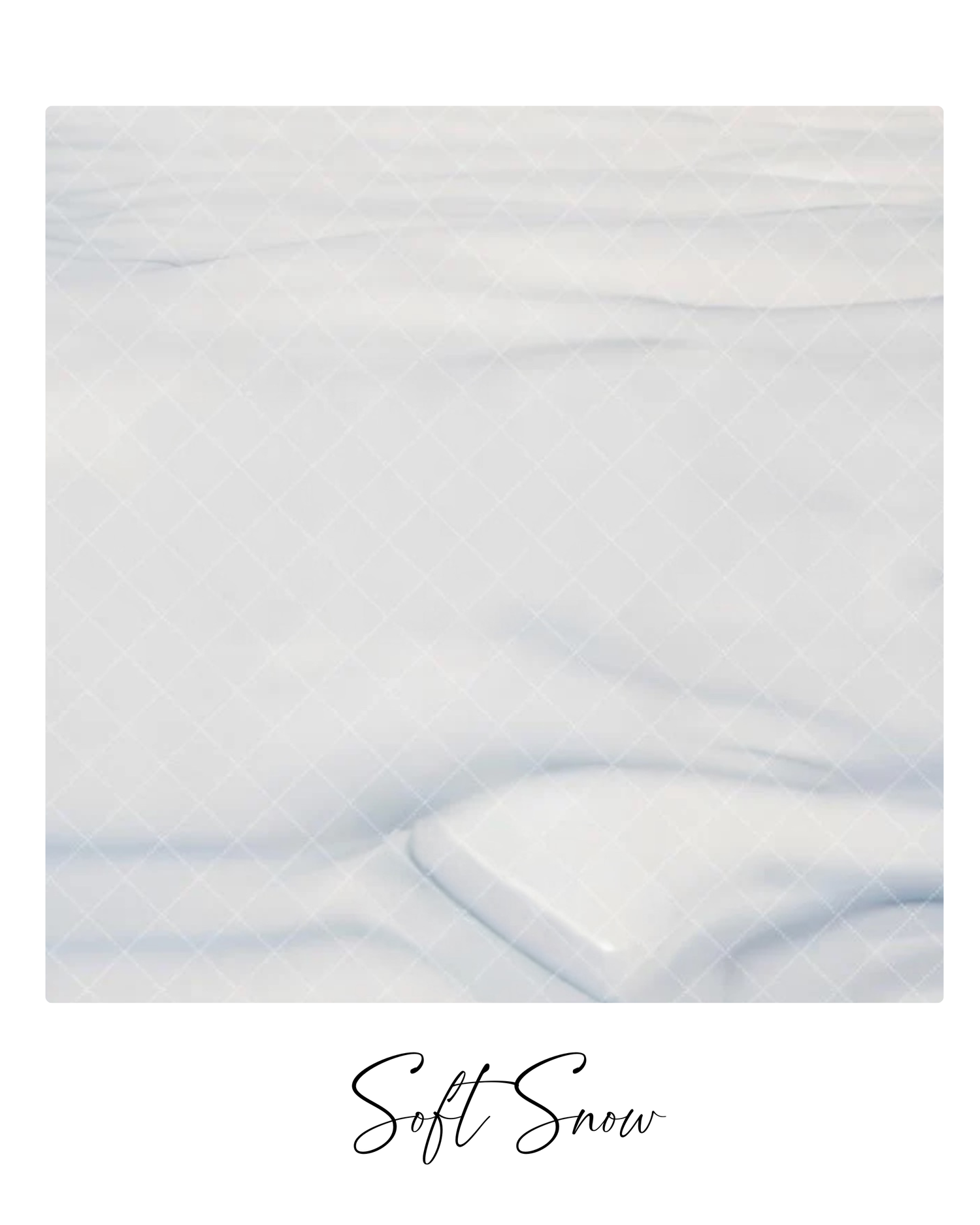 A pristine blanket of soft white snow covers a gentle slope creating a peaceful winter landscape.