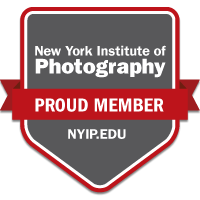 Professional photography certification and membership logos in red and gray.