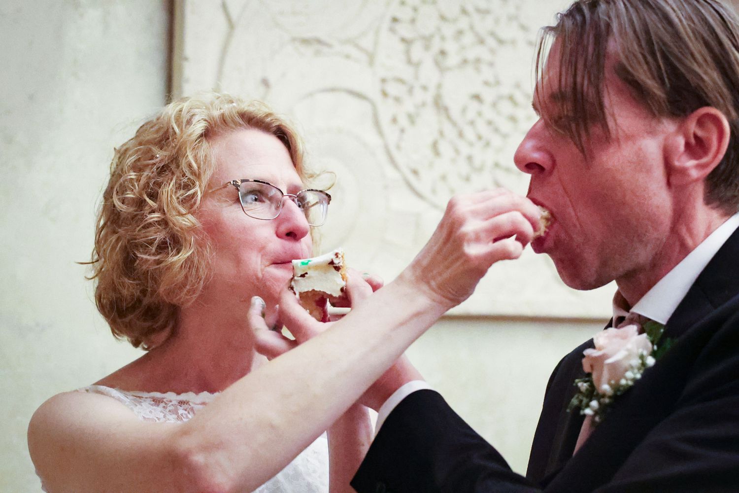 A sequence of five romantic wedding photos showing a couple dancing together at their reception.