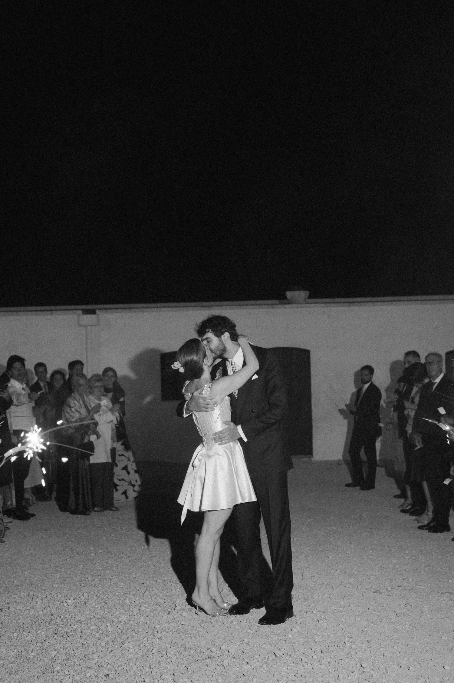 Black and white photo of couples dancing at a formal event.