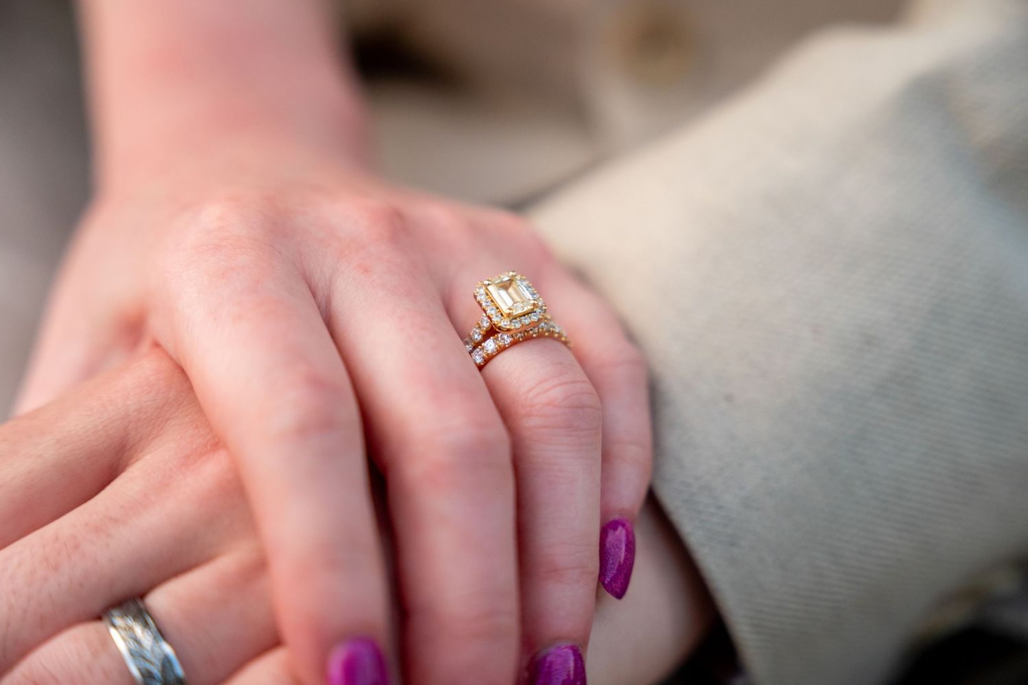 Close-up series of hands showing engagement ring from different angles with purple nail polish.