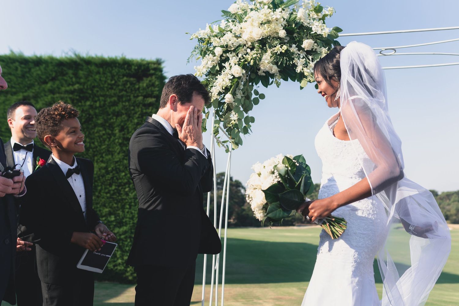 A collage of wedding ceremony moments showing a couple exchanging vows outdoors with floral decorations and guests.