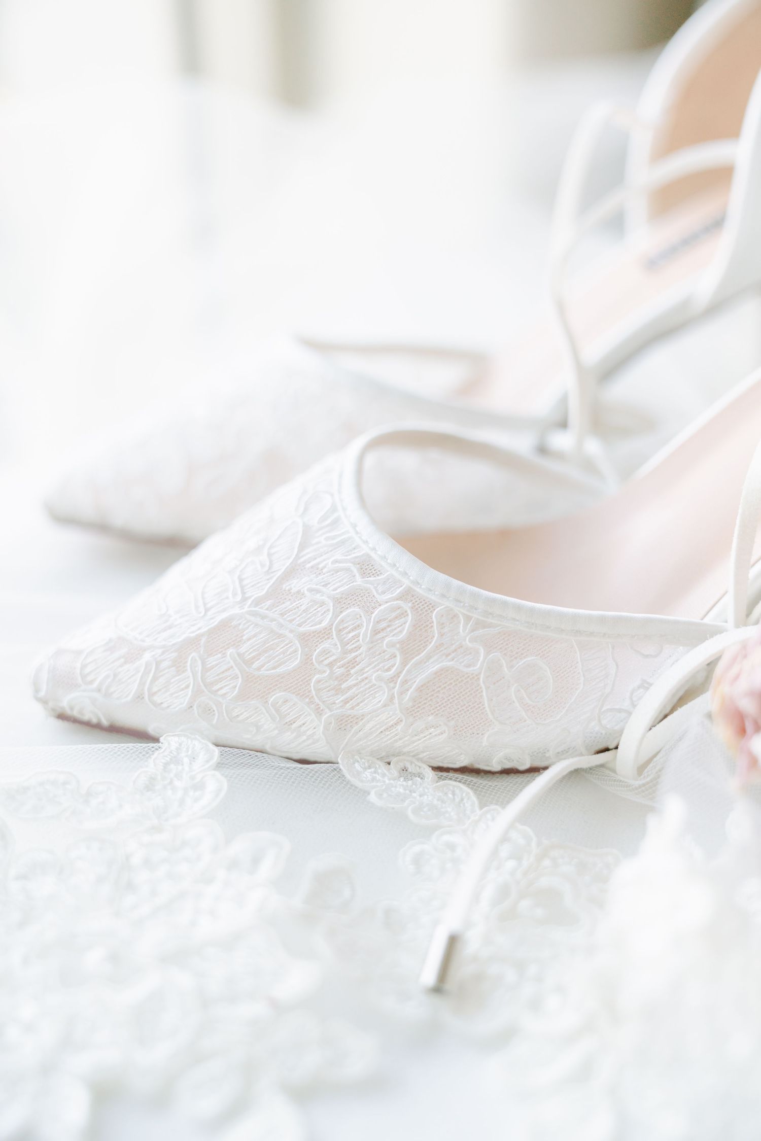Elegant wedding details featuring delicate veils and shoes, captured in timeless style at a Northern Utah wedding session.