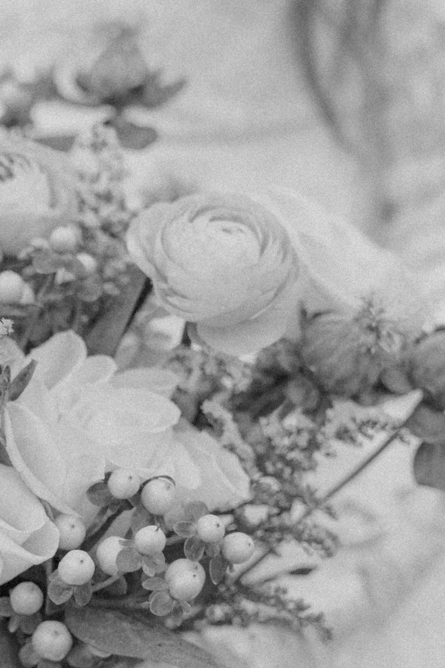 black and whites photography of colorful bridal bouquet