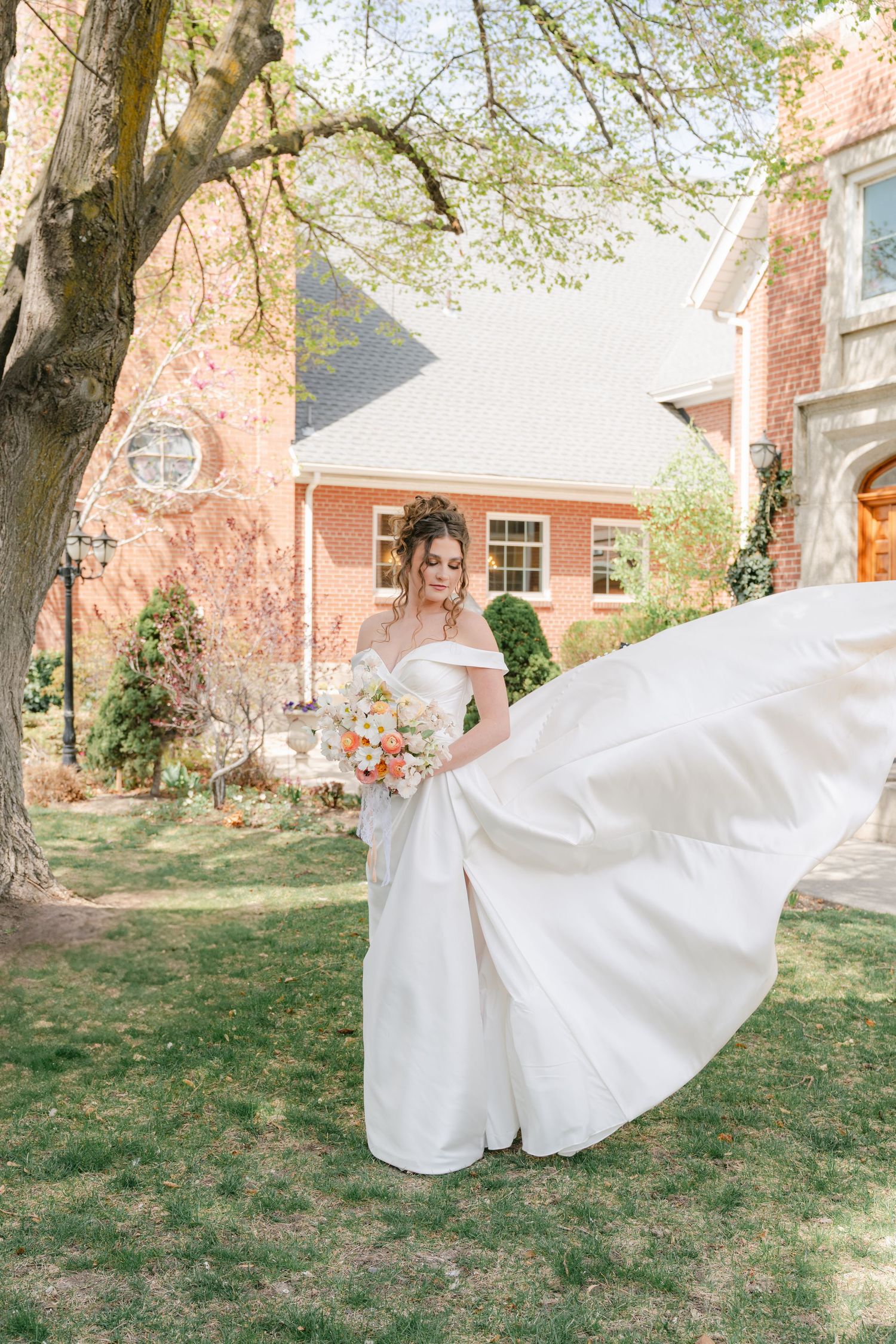 Bride in a stunning wedding dress at The North Hampton House, Northern Utah, captured with timeless elegance and true-to-color style.