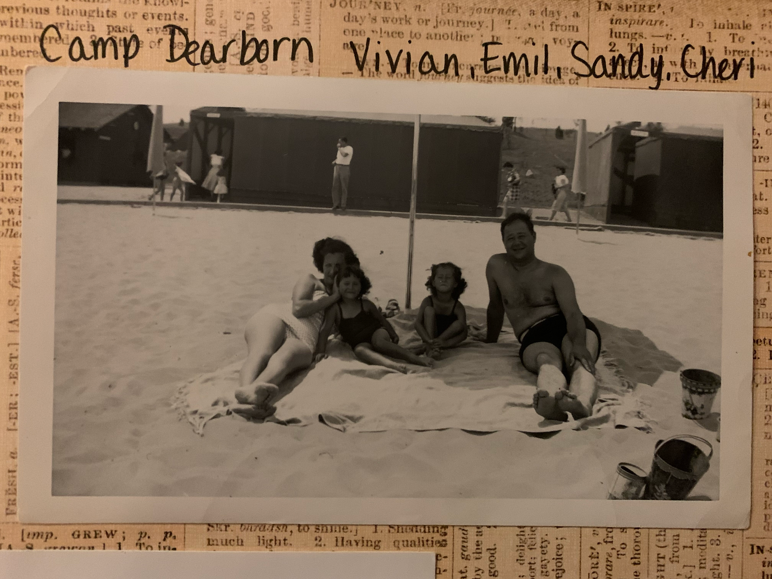 Black and white photographs arranged in a row showing people at Camp Dearborn engaging in outdoor activities.