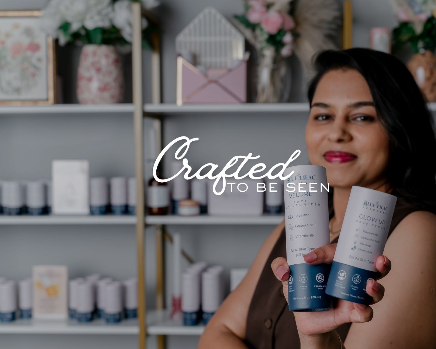 Woman holding skincare products in a boutique shop with text Crafted to be Seen on a floral background.