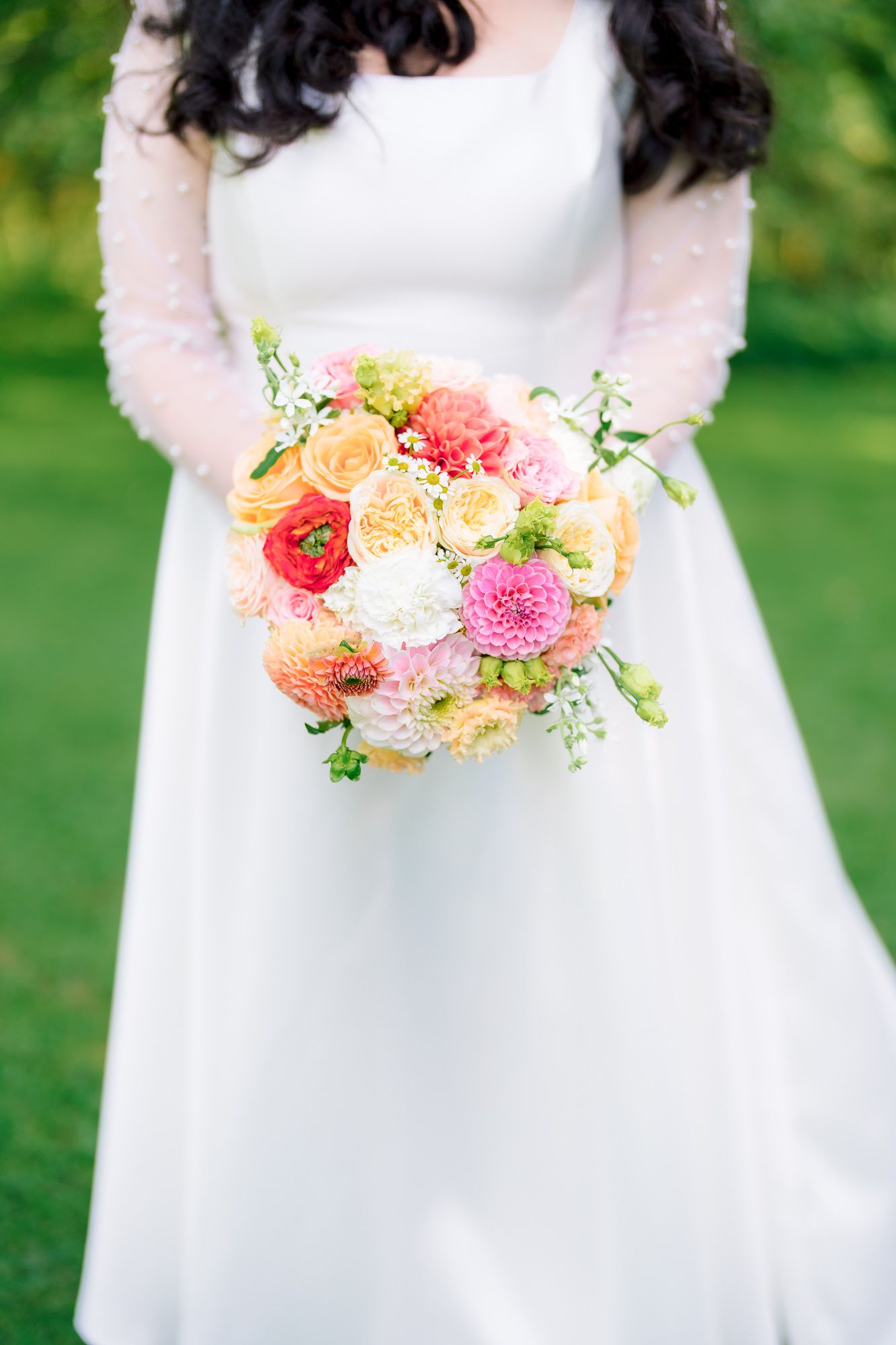 A series of cropped bridal photos showing a peach and coral wedding bouquet against a white dress with a garden backdrop.